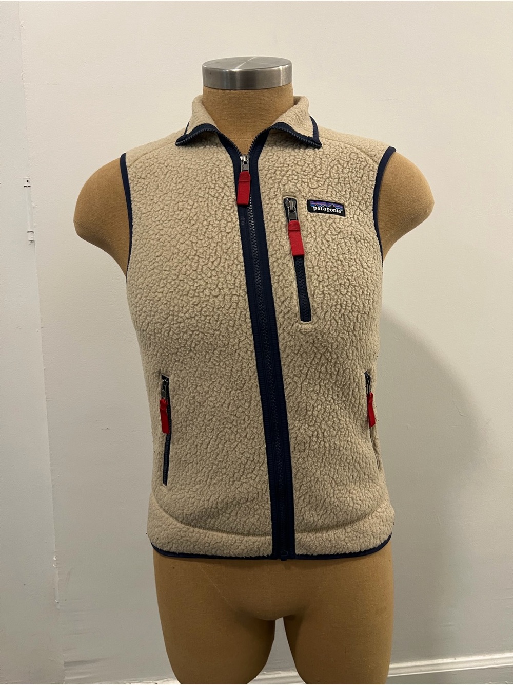 Patagonia Men’s Cream Sherpa Zip Vest with Navy Trim & Red Accents